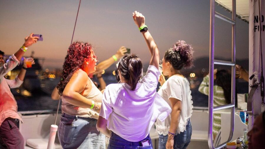 Cabo San Lucas: Sunset Party Cruise with Open Bar - Music, drinks, snacks, and the social mood