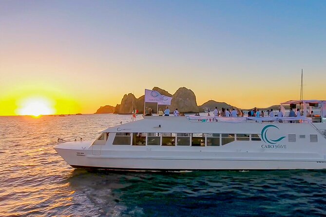Cabo Sunset Dinner Cruise with Live Music & Open Bar on Cabo Wave - Dinner below deck with music and drinks