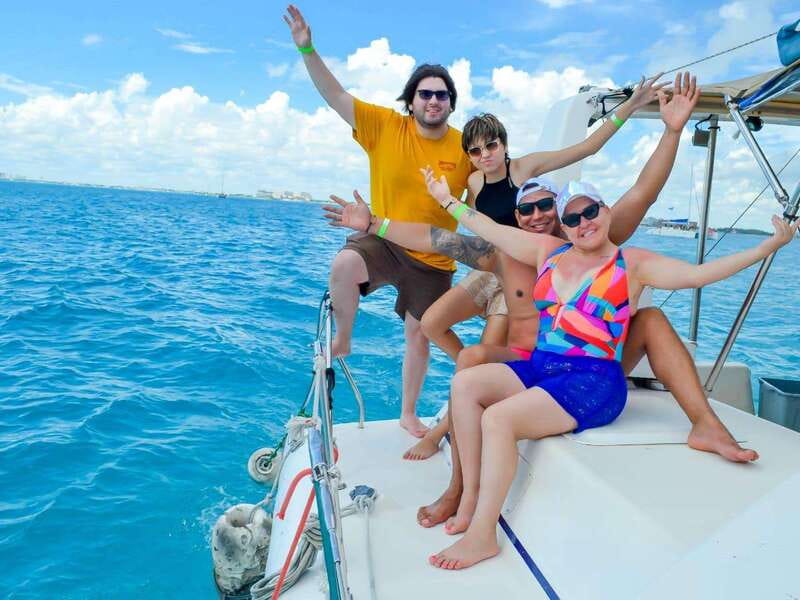Cancun: Isla Mujeres Catamaran Tour with Open Bar of Drinks - A short snorkeling stop in the Caribbean Sea