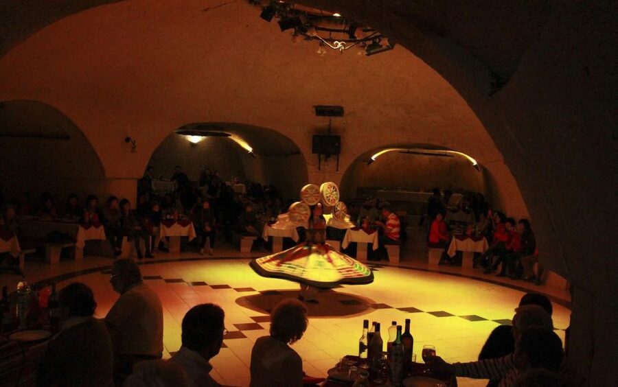 Cappadocia: Turkish Night with Dinner-Unlimited Drinks - Arriving at a Cappadocia cave restaurant