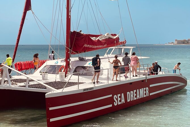 Catamaran Party Cruise and Snorkeling in Montego Bay - Snorkeling and swimming in Caribbean water
