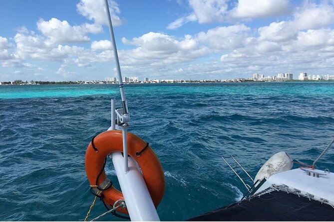 Catamaran to Isla Mujeres, Open bar, buffet, Beach Club Included - Reaching Isla Mujeres by catamaran