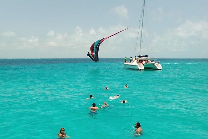 Catamaran to Isla Mujeres, Open bar, buffet, Beach Club Included - Two hours to walk, shop, or find the beach