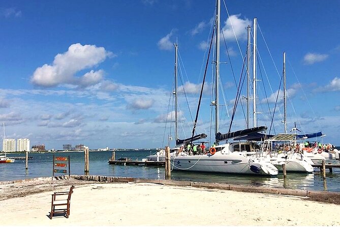 Catamaran to Isla Mujeres, Open bar, buffet, Beach Club Included - What the best parts of the experience look like