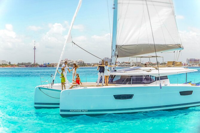 Catamaran to Isla Mujeres Snorkeling Tour with Open Bar and Lunch - The open bar, music, and Spinnaker option