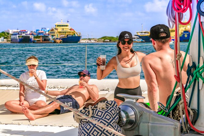 Catamaran to Isla Mujeres Snorkeling Tour with Open Bar and Lunch - Beach club, buffet lunch, and time by the water