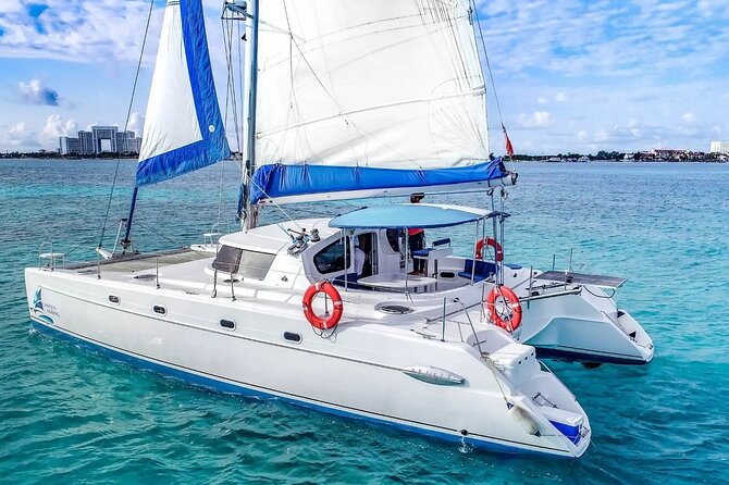Catamaran Tour to Isla Mujeres from Cancún with Bar and Lunch - Morning pickup and the start at Playa Tortugas