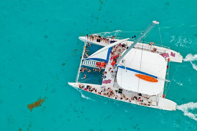Catamaran Tour to Isla Mujeres Open bar and Lunch - Timing, cancellation, and what to bring
