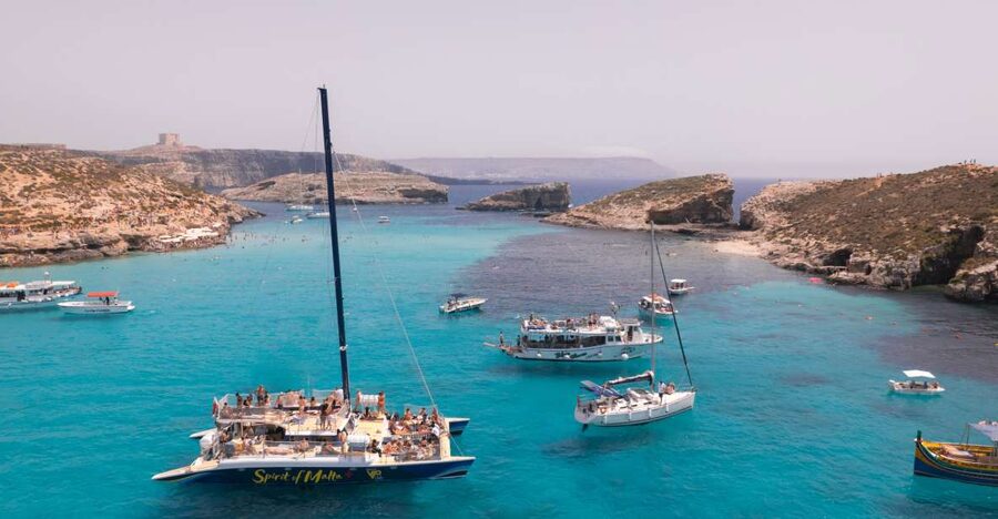 Comino: Blue Lagoon Catamaran Cruise with Lunch and Open Bar - The morning sail: calm water, changing plans