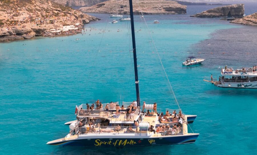 Comino: Blue Lagoon Catamaran Cruise with Lunch and Open Bar - Blue Lagoon and Comino from the water