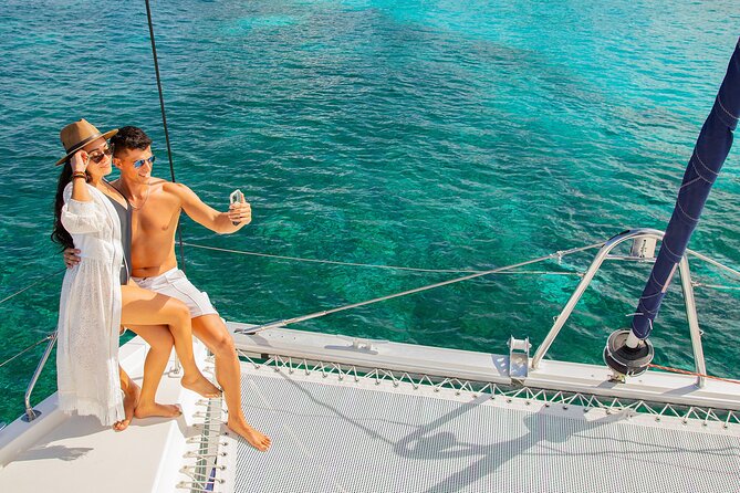 Cozumel Luxury Sailing & Snorkeling with Lunch and Open Bar Onboard - Lunch, cocktails, and the floating social scene