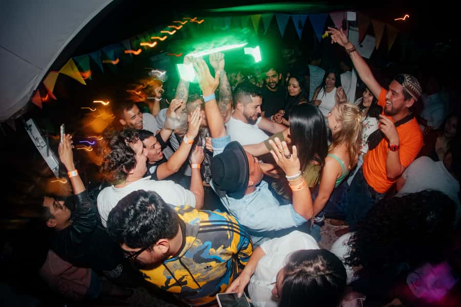 Cusco: Pub Crawl with Skip-the-Line Access and Drinks - Walking through Cusco after dark
