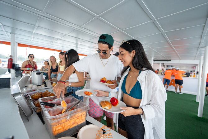 Dancer Cruise Isla Mujeres Snorkel Food and Drinks Included - The return trip becomes the main party