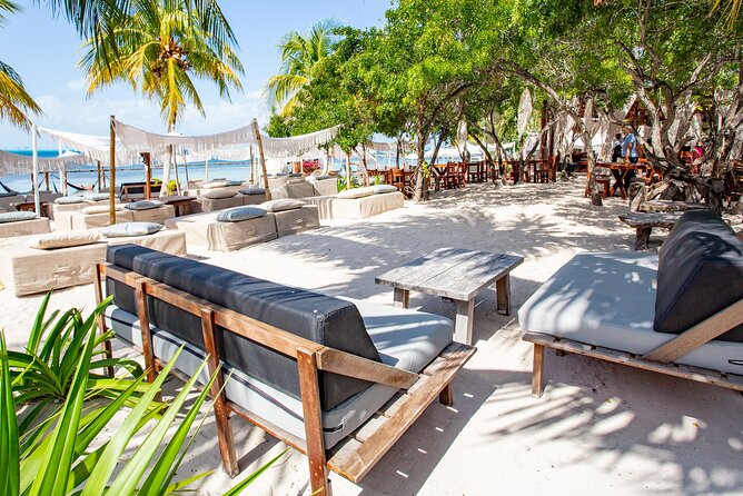 Deluxe Catamaran tour to Isla Mujeres with Open Bar and Lunch - Lunch and beach time at Albatros Beach Club