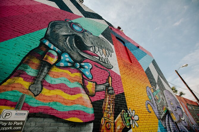 Denver's Beer and Graffiti Walking Tour - Reading RiNo’s murals between stops