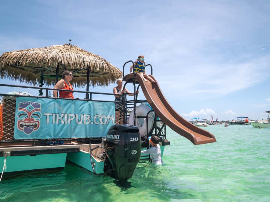 Destin: Tiki Pub Crab Island Sandbar Cruise with Waterslide - What the Tiki Pub Adds