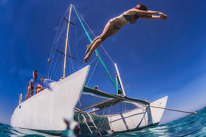 Discover Isla Mujeres: Catamaran, Snorkeling, and "Ice Bar" - Pickup from Cancun, Puerto Morelos, and Playa del Carmen