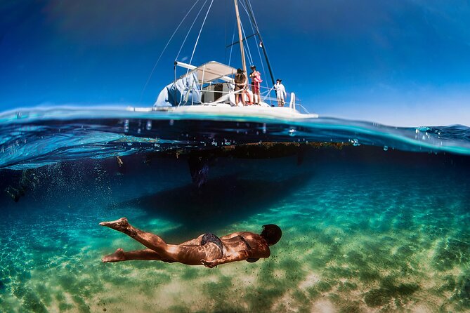 Discover Isla Mujeres: Catamaran, Snorkeling, and "Ice Bar" - Waiting at the marina before departure
