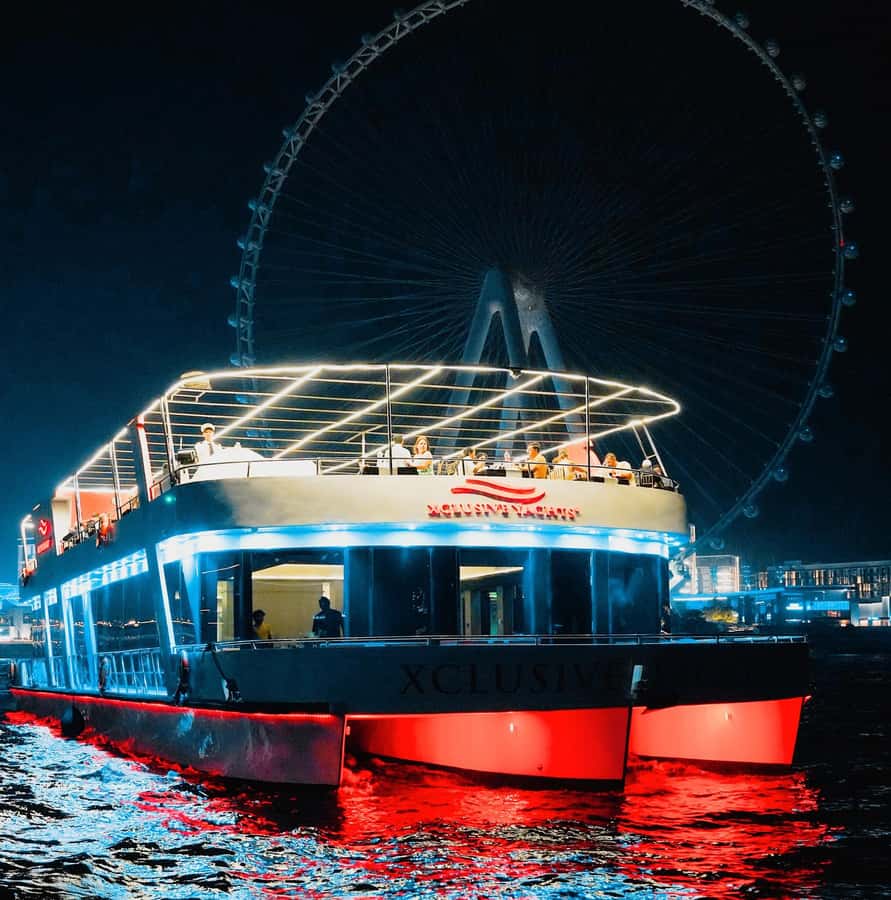 Dubai: Sunset or Dinner Cruise with Live Music & Open Bar - Boarding, seating, and the best place for views