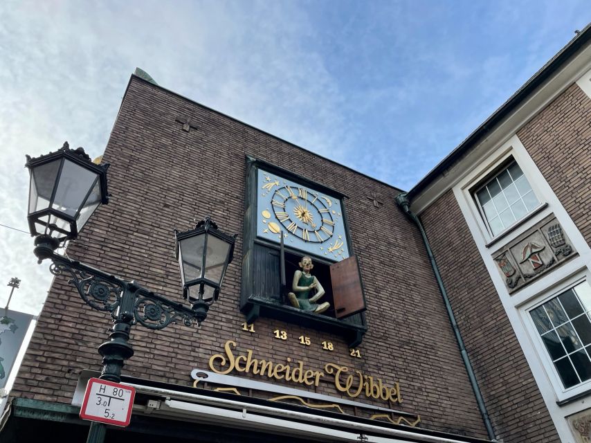 Düsseldorf: Guided Old Town Tour with Beer Break - From Louis Vuitton to the Old Town