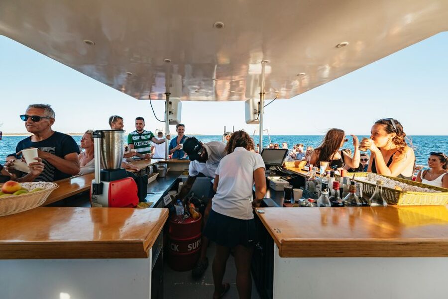 From Albufeira: Sunset Cruise and Beach BBQ with Open Bar - Music, fire performances, and the changing mood