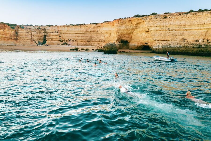 From Albufeira: Sunset Cruise and Beach BBQ with Open Bar - The sunset over Armação de Pêra