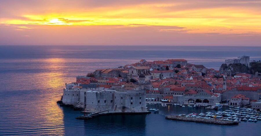 From Dubrovnik: Golden Hour Sunset Cruise with Free Drinks - Golden hour, sparkling wine, and music