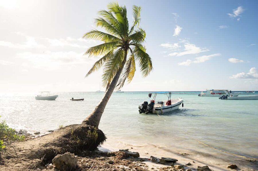 From Punta Cana: Catamaran Tour to Saona Island with Open Bar and Buffet - Boarding the boat and heading toward Saona
