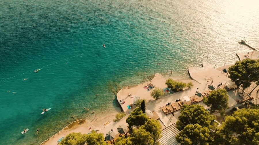 From Split: Brač Island Beach Bar and Pool Party - Swimming, Cabanas, and Time Away From the Dance Floor