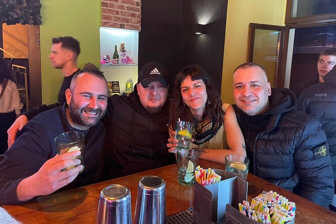 Fun Explorers Pub Crawl with free welcome shots and free ent - Starting in Krakow’s Old Town under the orange umbrella