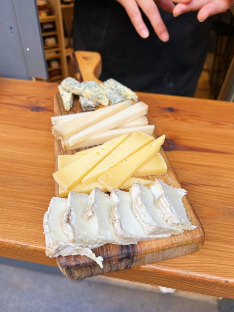 Girona Evening Food Tour & Tapas Bar Experience - Plaça de l’Oli, Plaça del Vi, and regional food