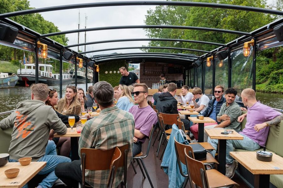 Groningen: Terrace Boat Experience with a Cozy Bar - From concrete steps to a floating café