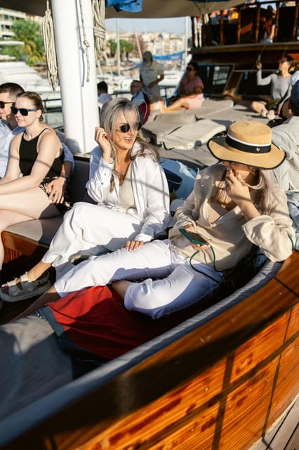 Half-Day Athens Cruise: Swim Stop,Lunch, and Drinks Included - The onboard mood: music, sun, and easy conversation