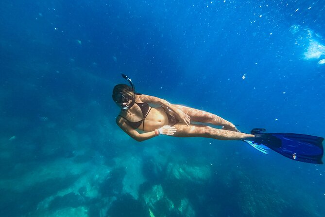 Half Day Cabo Snorkel Adventure with Lunch and Open Bar - Setting sail on a three-deck catamaran