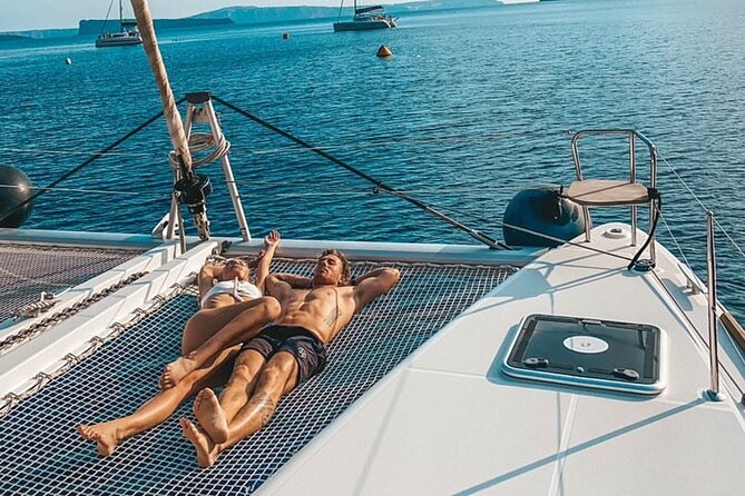 Half-Day Exclusive Catamaran Cruise in Santorini with Meal and Open Bar - Thirassia Island and Time to Snorkel