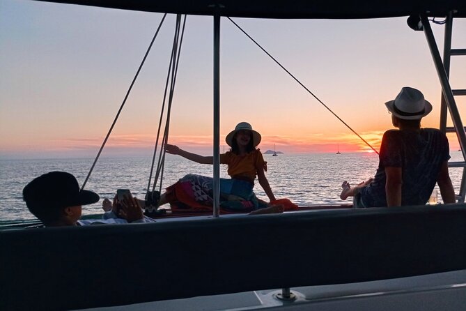 Half-Day Exclusive Catamaran Cruise in Santorini with Meal and Open Bar - Sailing Past Fira and the Black Rock