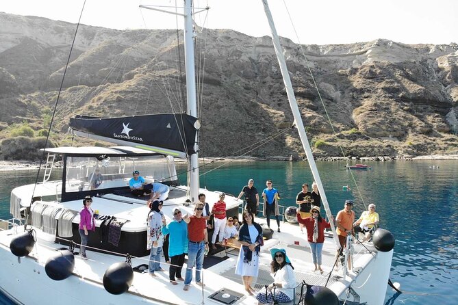 Half-Day Exclusive Catamaran Cruise in Santorini with Meal and Open Bar - What Comes From the Galley