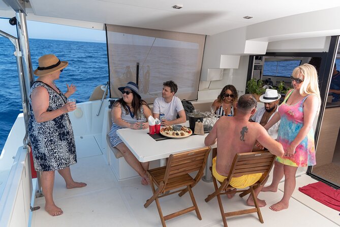 Hersonissos: Luxury Sunset Catamaran Cruise Sushi & Open Bar - Watching the Cretan sunset from the catamaran