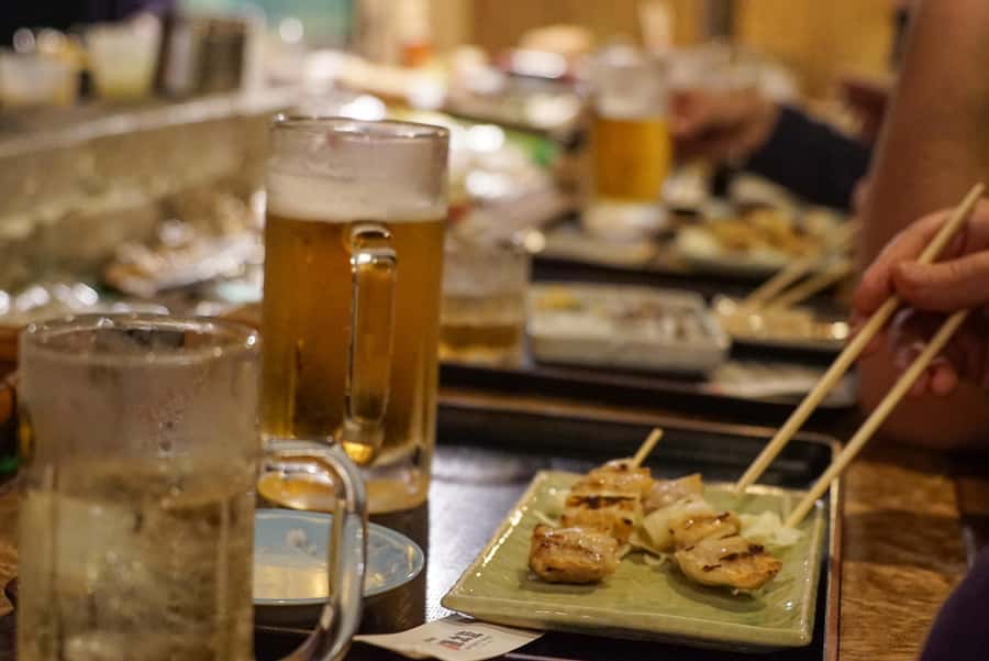 Hiroshima: Bar Hopping Food Tour - Second stop: backstreet food and local drinks