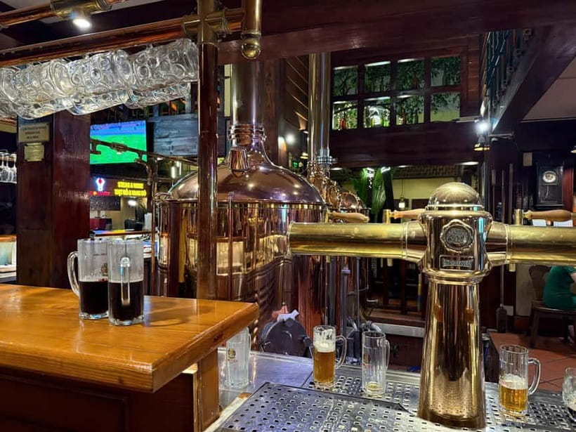 Ho Chi Minh City: Craft Beer and Local Food Tour by Scooter - Alley bars, local restaurants, and conversation