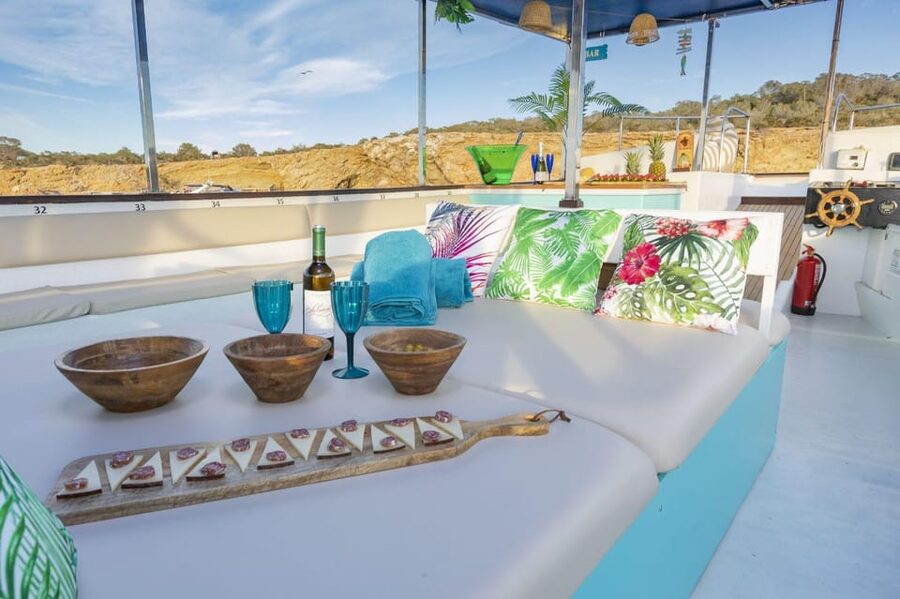 Ibiza by Sea: Coves, Caves, Water Sports & Open Bar - Cala Comte brings the water activities