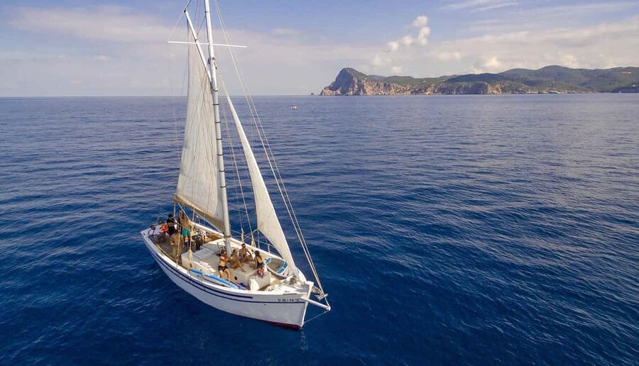 Ibiza: Sunset Private Sailboat with Tapas & Premim Open Bar - Cala Bassa brings the first swim stop