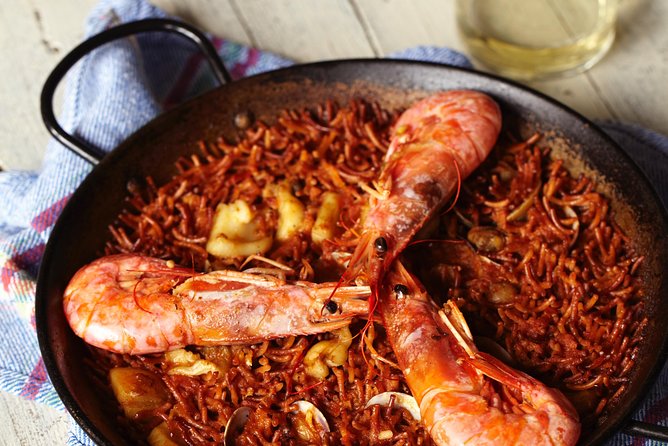 Interactive Paella & Market: Bottomless Wine & Rambla Views - Who should book this experience