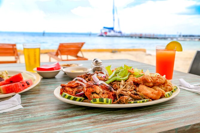 Isla Mujeres Catamaran Tour with Open Bar, Lunch and Snorkeling - Lunch at the beach club