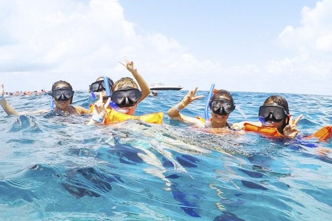 Isla Mujeres Catamaran Tour with Snorkel, Open bar and Transport - Playa Tortugas starts the day early