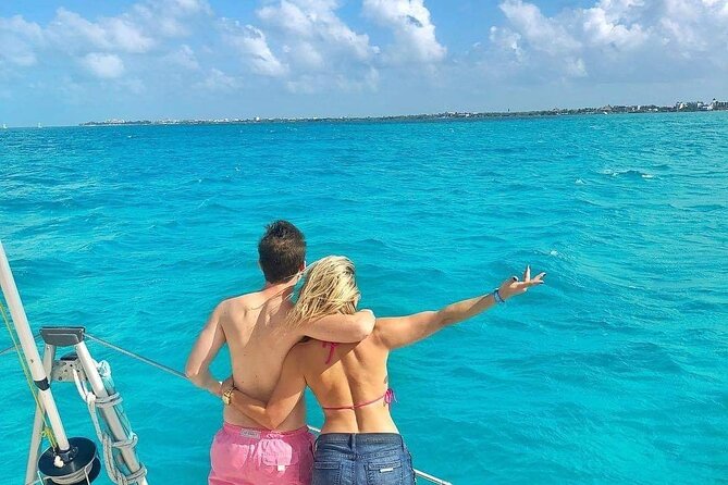 Isla Mujeres Catamaran Tour with Snorkel, Open bar and Transport - The return sail keeps the party going