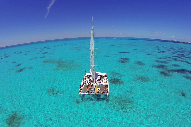 Isla Mujeres Catamaran Tour with Snorkeling at MUSA, Buffet Lunch & Open Bar - Lunch at the private beach club