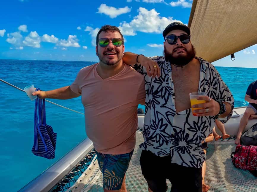 Isla Mujeres Catamaran Tour with Snorkeling & Open bar - The Return Ride, Music, and Spinaker Flight