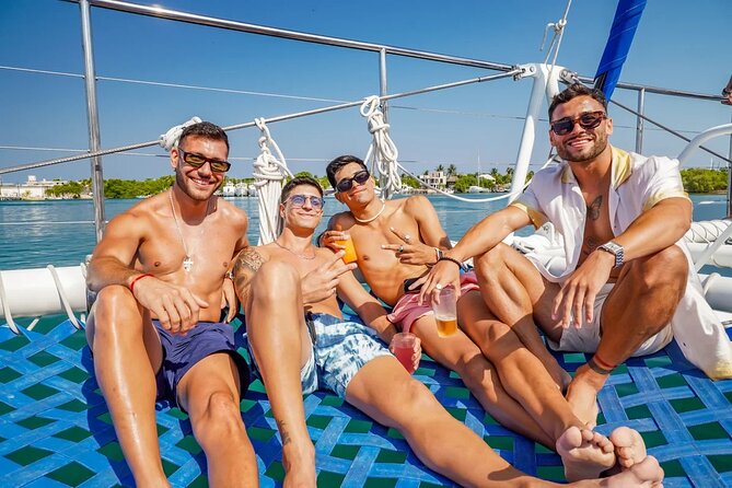 Isla Mujeres Cruise with Beach Club, Snorkel, Lunch and Open Bar - Lunch, beach club access, and extra charges