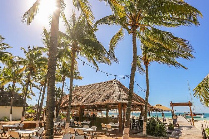 Isla Mujeres Cruise with Beach Club, Snorkel, Lunch and Open Bar - The return cruise and party atmosphere